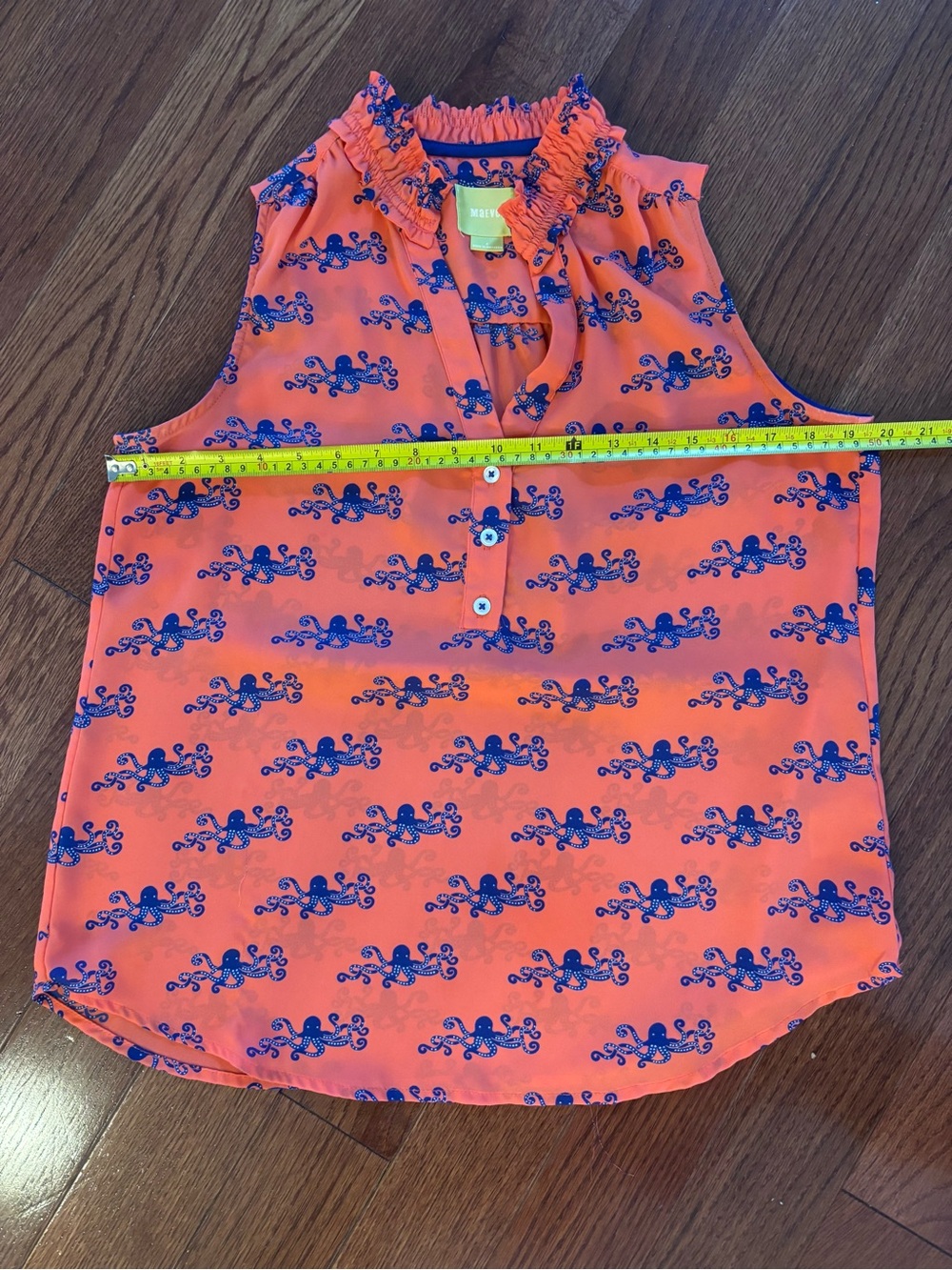 Maeve Coral Orange Sleeveless Ruffle Neck Top with Navy Print